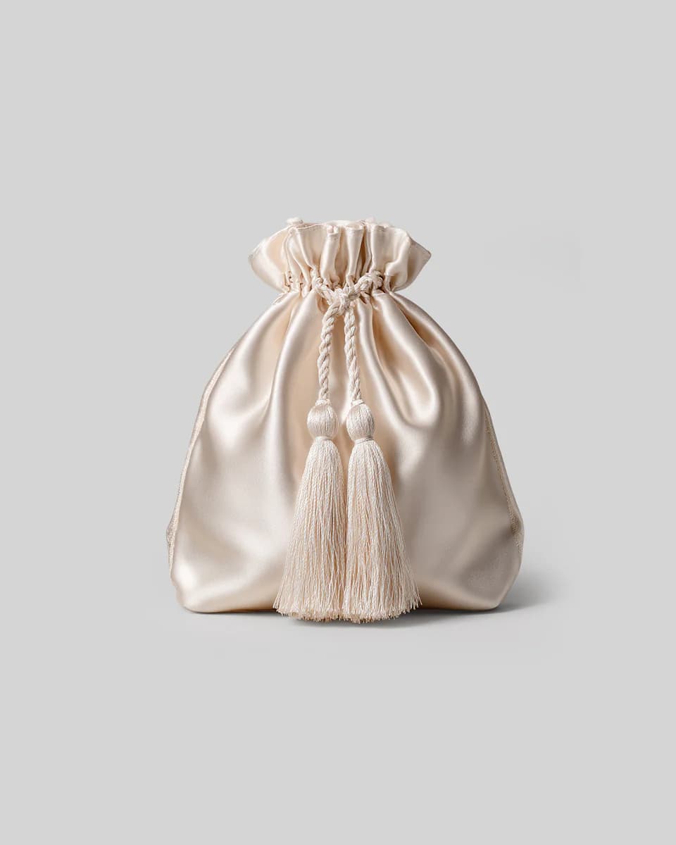 The Silk Tassel Clutch - Image 1