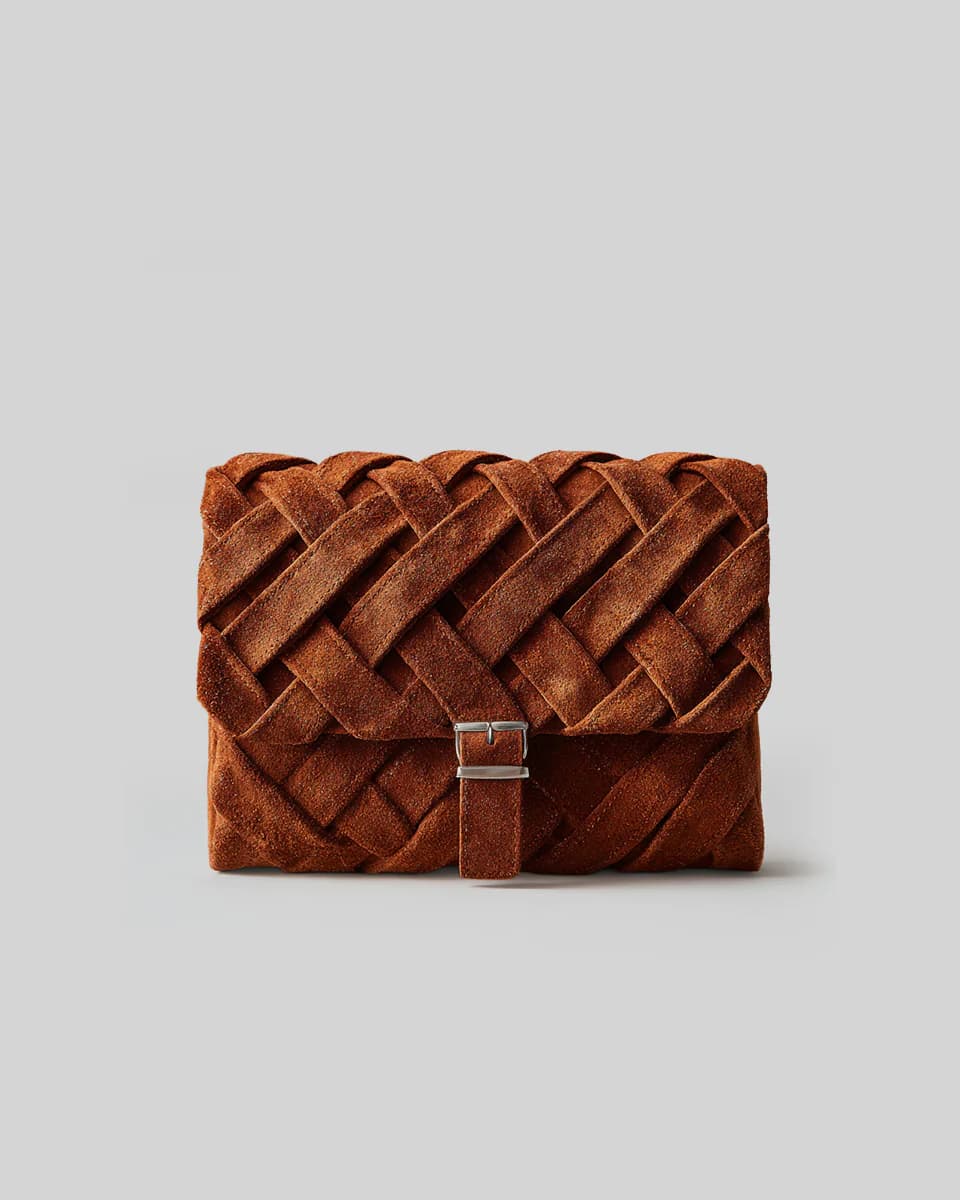 The Woven Suede Baguette Clutch - Image 1